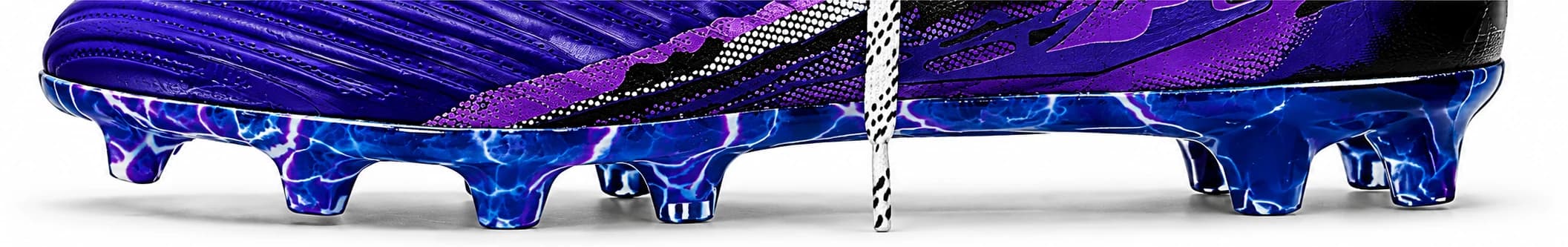 Close profile of the Talven outsole, showing the stud configuration and the marbled purple sole.