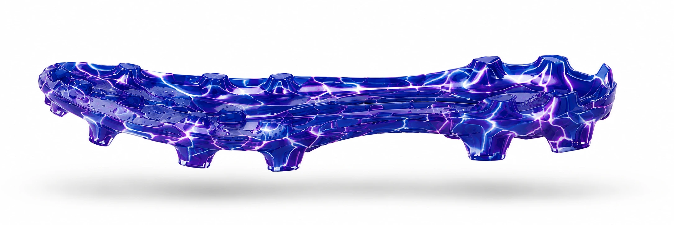 The Talven TPU outsole seen from underneath, showing the multi-directional stud configuration and the marbled purple finish.